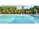 Large community pool with sun loungers and well-maintained landscaping at 3845 Williams Point Dr, Cumming, GA 30028