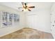 Bedroom featuring wood floors, a ceiling fan, natural light, and a closet at 4506 Reva Ne Way, Marietta, GA 30066