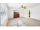 Bedroom featuring a window with blinds, closet, and dresser with television at 4506 Reva Ne Way, Marietta, GA 30066