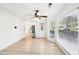 Bright dining area featuring hardwood floors, a ceiling fan, and a backdoor entry at 4506 Reva Ne Way, Marietta, GA 30066