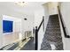 Foyer with stairs and slate tile flooring, showcasing the transition to the main living area at 4506 Reva Ne Way, Marietta, GA 30066