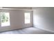 Spacious main bedroom offering natural light and a neutral color scheme at 1067 Crest Mill Dr, Marietta, GA 30008
