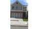 Charming two-story home featuring a brick facade and attached two-car garage at 1067 Crest Mill Dr, Marietta, GA 30008