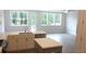 Bright kitchen featuring quartz countertops, modern appliances, and an island for extra space at 1067 Crest Mill Dr, Marietta, GA 30008