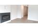 Cozy living room featuring a modern fireplace and an open floor plan at 1067 Crest Mill Dr, Marietta, GA 30008
