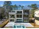 Modern home with multi-level decks and inviting pool at 1291 Sunderland Ct, Atlanta, GA 30319