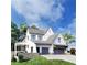 View of a home's side exterior with a large two-car garage and stone accents at 1291 Sunderland Ct, Atlanta, GA 30319