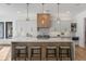 Stylish kitchen with a spacious island, pendant lighting, and modern appliances at 1291 Sunderland Ct, Atlanta, GA 30319