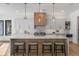 Bright kitchen with a large island, wood-look accents, and stainless steel appliances at 1291 Sunderland Ct, Atlanta, GA 30319