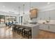 Contemporary kitchen featuring a large island with seating, open to a dining area with views to the outside at 1291 Sunderland Ct, Atlanta, GA 30319