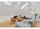 Contemporary Living Room featuring bright skylight, modern furnishings, and an open floorplan design at 2125 Datona Sw Dr, Atlanta, GA 30331