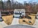 Charming home with a two-car garage, set in a tranquil cul-de-sac, surrounded by trees at 4825 Marco Ln, Cumming, GA 30028