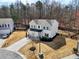 Charming home with a two-car garage, set in a tranquil cul-de-sac, surrounded by trees at 4825 Marco Ln, Cumming, GA 30028