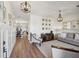 Sunlit living room with hardwood floors and stylish decor at 4825 Marco Ln, Cumming, GA 30028