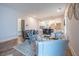 Comfortable living room with sleek furniture, hardwood floors, and an open design that flows into the kitchen at 973 Parsons Sw St, Atlanta, GA 30314