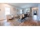 Bright living room with hardwood floors, neutral paint, and modern furnishings creates a welcoming atmosphere at 973 Parsons Sw St, Atlanta, GA 30314