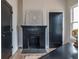 Spacious office with a black brick fireplace, hardwood floors, and natural light at 973 Parsons Sw St, Atlanta, GA 30314