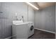 Laundry room features a washer and dryer with room for storage at 1833 Lost Mountain Rd, Powder Springs, GA 30127
