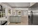 Charming kitchen with granite countertop, stainless appliances, and an open view to the living area at 2462 Macon Sw Dr, Atlanta, GA 30315