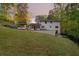 Large backyard featuring a well-manicured lawn and a charming patio for outdoor relaxation and entertainment at 2672 Langland Ne Ct, Atlanta, GA 30345