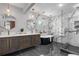 Contemporary bathroom with marble walls, freestanding tub, and modern fixtures at 2672 Langland Ne Ct, Atlanta, GA 30345