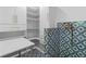 Unique space featuring blue patterned tiles and built-in shelving at 2672 Langland Ne Ct, Atlanta, GA 30345