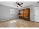 Bright bedroom features hardwood floors and a unique Murphy bed with built-in desk at 2672 Langland Ne Ct, Atlanta, GA 30345