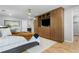 Bedroom featuring a TV, and built in storage and display shelving at 2672 Langland Ne Ct, Atlanta, GA 30345