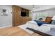 Bedroom with a large wardrobe, wood floors, and natural light at 2672 Langland Ne Ct, Atlanta, GA 30345