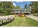 Beautiful two-story home with lush front yard landscaping at 2672 Langland Ne Ct, Atlanta, GA 30345
