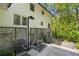 Outdoor shower area with decorative privacy screens and access steps at 2672 Langland Ne Ct, Atlanta, GA 30345