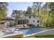 Backyard features a pool, hot tub and outdoor seating at 2672 Langland Ne Ct, Atlanta, GA 30345