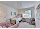 Charming bedroom featuring a comfortable bed, soft decor, a large window, and cozy atmosphere for restful nights at 2698 Ne Almand Ln, Conyers, GA 30013