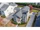 A beautiful home boasting a private driveway, welcoming porch, and meticulously maintained landscaping at 3660 Lake Pass Ln, Suwanee, GA 30024