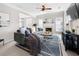 Inviting living room boasts a cozy fireplace, plush sofa, and stylish decor for a relaxing atmosphere at 3660 Lake Pass Ln, Suwanee, GA 30024