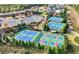 Community amenities include impeccably kept tennis courts nestled in beautifully landscaped surroundings at 3660 Lake Pass Ln, Suwanee, GA 30024