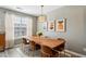 Formal dining room with a wood table, modern chandelier, and stylish decor at 3736 Chattahoochee Summit Se Dr # 20, Atlanta, GA 30339