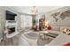 Cozy living room with a fireplace, plush sofa, stylish decor, and ample natural light at 3736 Chattahoochee Summit Se Dr # 20, Atlanta, GA 30339