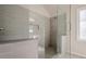 Modern bathroom showcasing a glass-enclosed shower with gray tile and updated fixtures at 186 Brandi Dr, Hiram, GA 30141