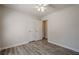 Neutral bedroom offering wood floors, ceiling fan, closet and door to another room at 186 Brandi Dr, Hiram, GA 30141