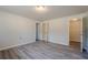 A spacious bedroom features wood-look flooring and ample closet space at 186 Brandi Dr, Hiram, GA 30141