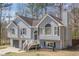 Charming two-story home features a two-car garage and a welcoming front porch at 186 Brandi Dr, Hiram, GA 30141