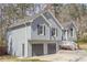 Gray two-story home with a two-car garage and a well-manicured front yard at 186 Brandi Dr, Hiram, GA 30141