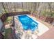 Aerial view of a fenced swimming pool with concrete deck in backyard at 186 Brandi Dr, Hiram, GA 30141