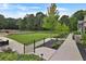 Landscaped backyard with manicured lawn, stone pathway, and partially fenced perimeter at 2171 James Aly, Atlanta, GA 30345