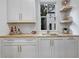 Charming bar area with custom cabinets, wood countertop, and natural light from the window at 2171 James Aly, Atlanta, GA 30345