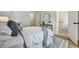 Relaxing bedroom with a patterned rug, white bedding, and natural light at 2171 James Aly, Atlanta, GA 30345