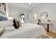 White Bedroom featuring view to on-suite bathroom, white bedding, and decor at 2171 James Aly, Atlanta, GA 30345