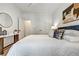Elegant Bedroom view of closet door, white bedding, and decor at 2171 James Aly, Atlanta, GA 30345