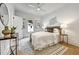 Bright bedroom featuring a ceiling fan, stylish rug, and neutral decor at 2171 James Aly, Atlanta, GA 30345